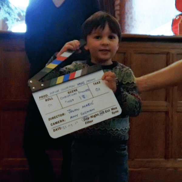 Jovan's son using the clapper in a cute gif