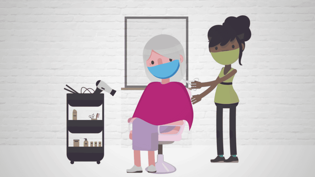 mask wearing hair dresser