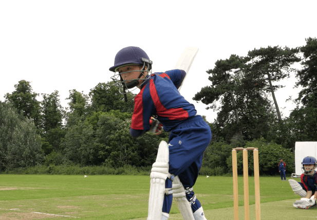 video still of children playing cricket london
