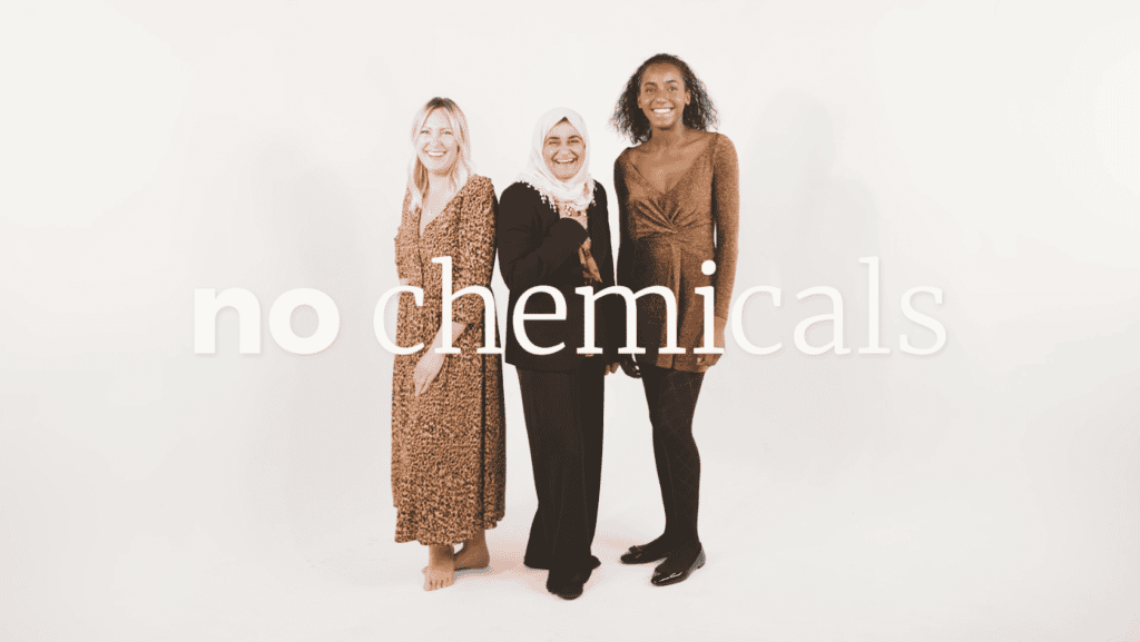 3 women smiling at the camera