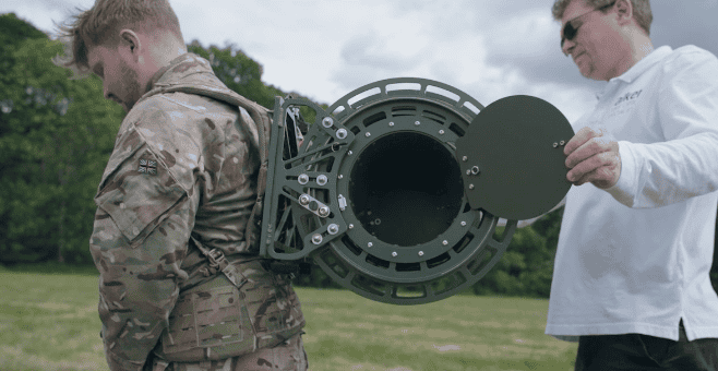 In field example of the deployable reel being loaded by a technician