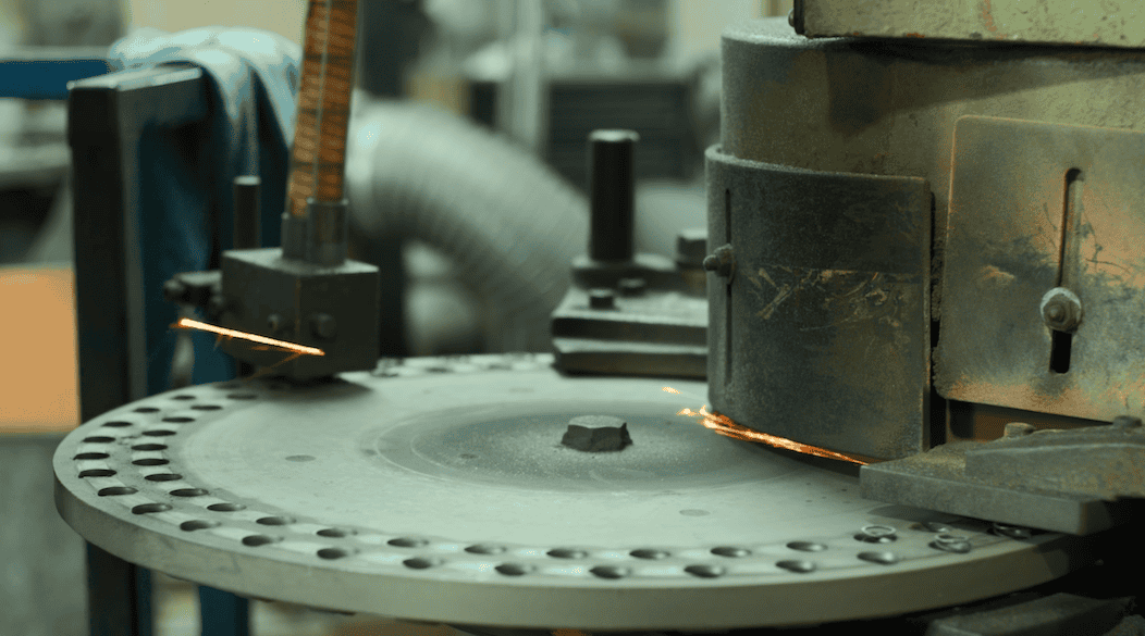 Shot of a grinder with sparks coming off it
